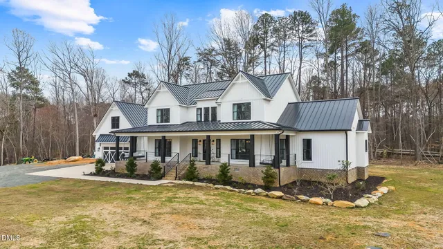 a view of a room with furniture window and wooden floor