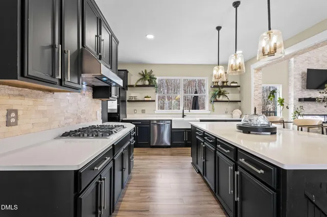 a bedroom with a bed and a lamp