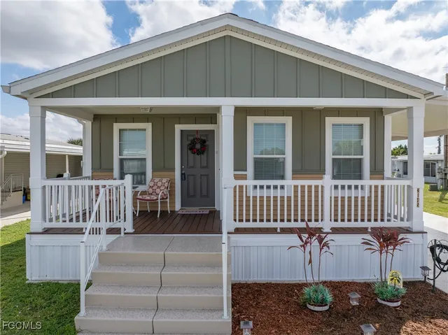 a front view of a house with a porch