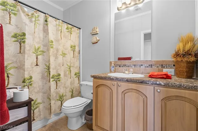 a view of bathroom with a washer and dryer