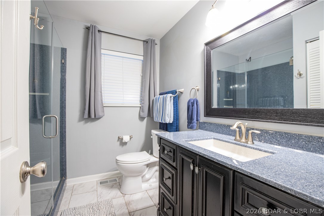 258 Northview Road Sunrise Beach, MO 65079 - Photo 11 of 35 Primary Suite Bathroom