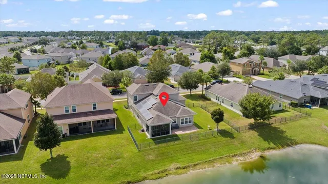 a view of a house with a big yard
