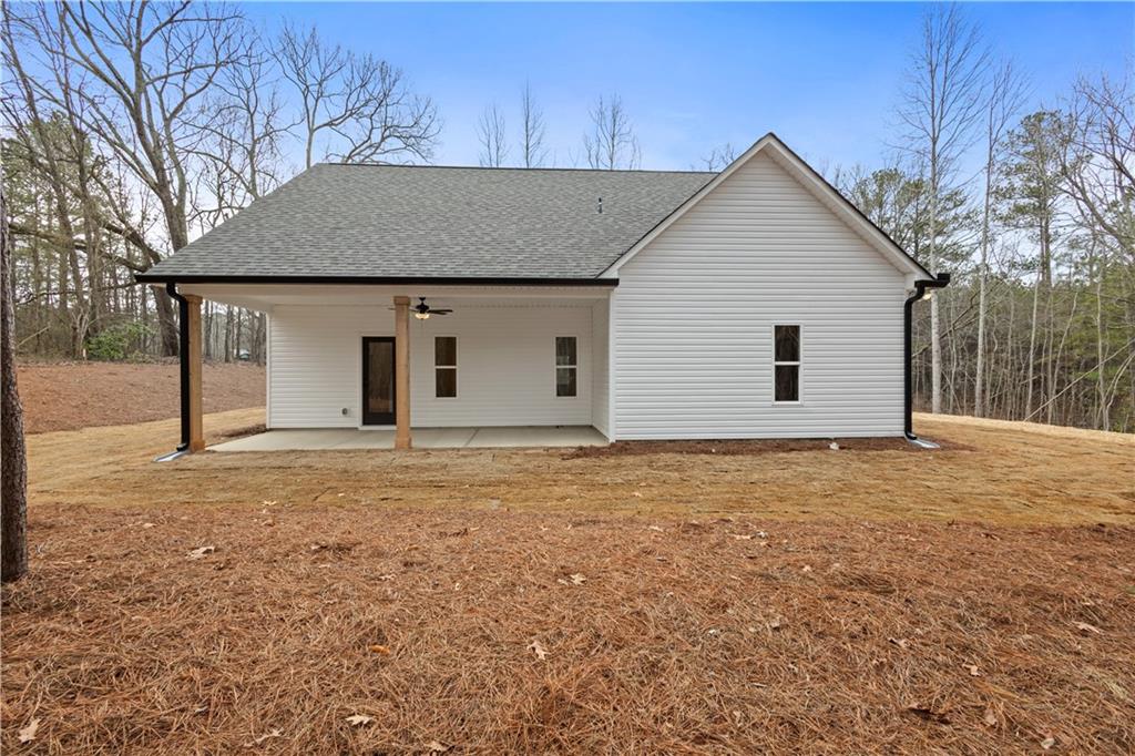 3230 Steadman Road Tallapoosa, GA 30176 - Photo 35 of 52 a house with white door of garage