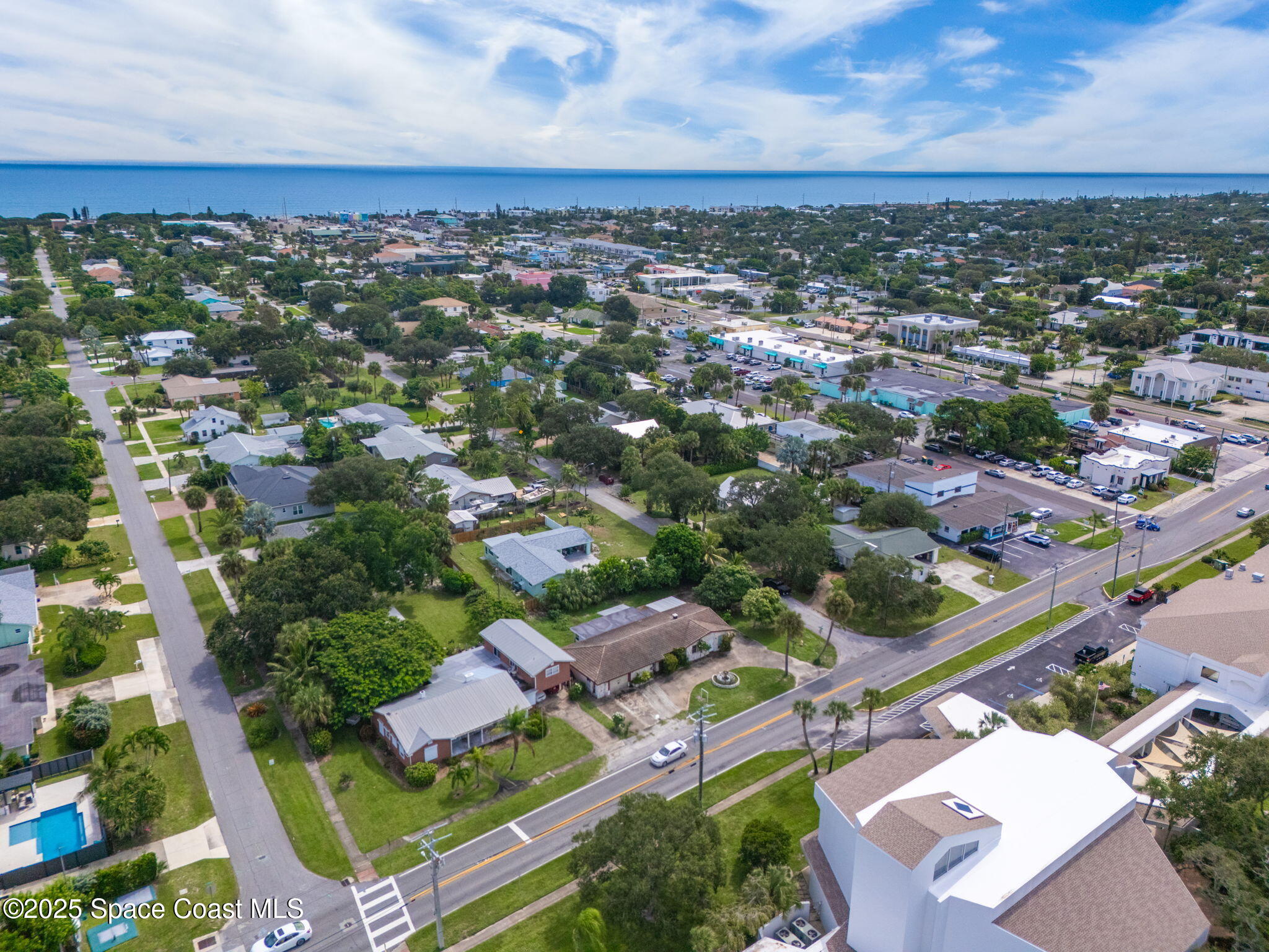 303 North Riverside Drive Indialantic, FL 32903 - Photo 4 of 7 an aerial view of residential houses with outdoor space