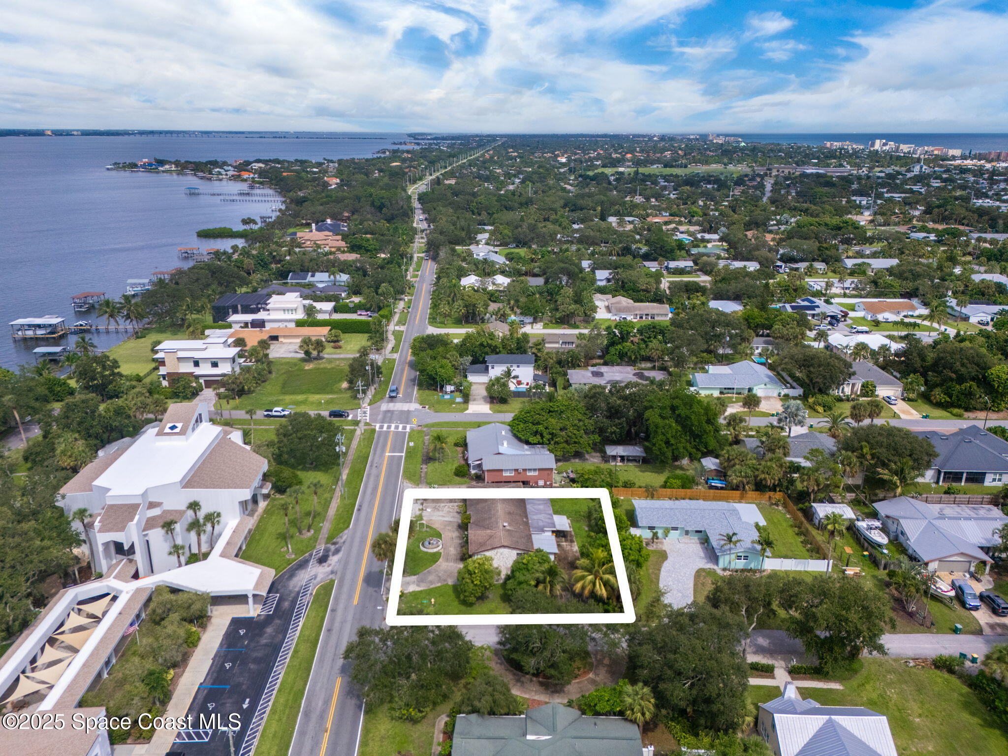 303 North Riverside Drive Indialantic, FL 32903 - Photo 5 of 7 an aerial view of residential building with outdoor space