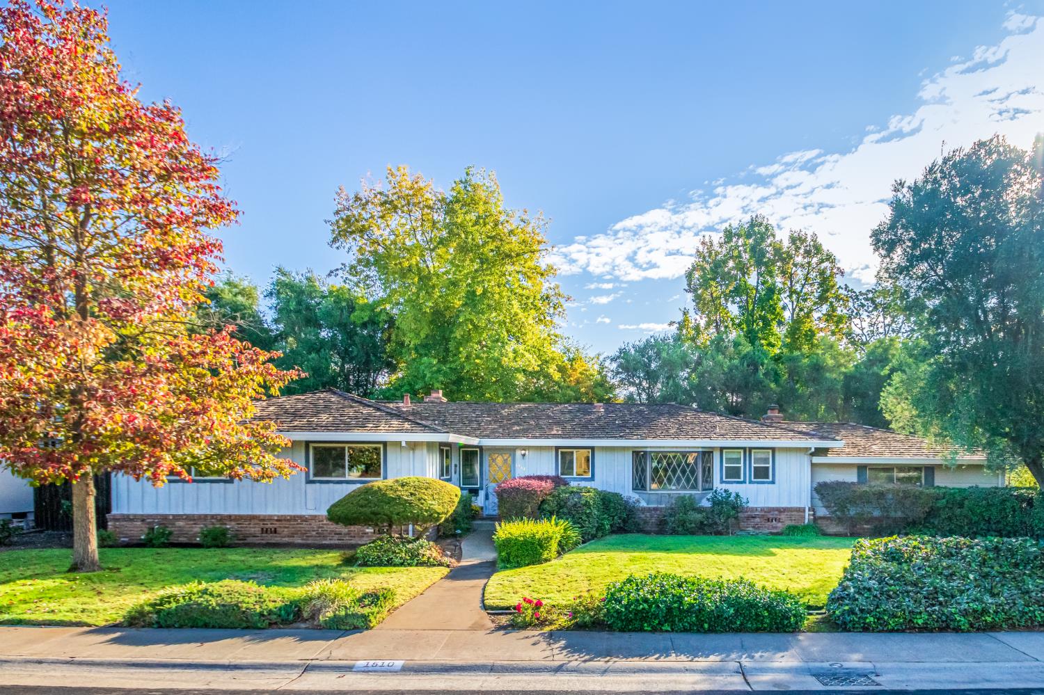 1510 Barnett Circle Carmichael, CA 95608 - Photo 1 of 1 a front view of a house with yard and green space