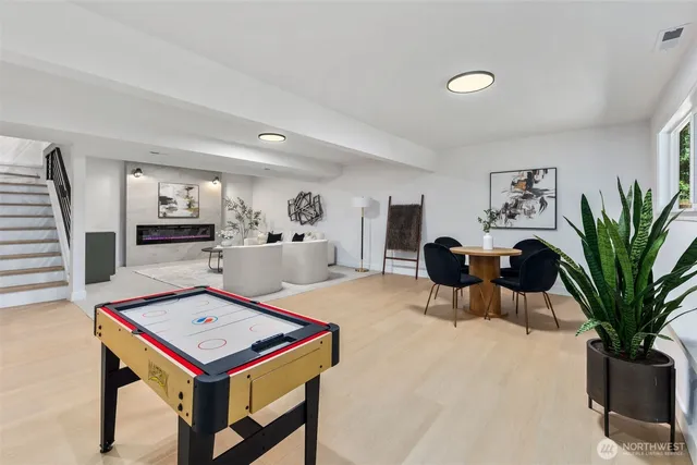 a bedroom with bed and a window