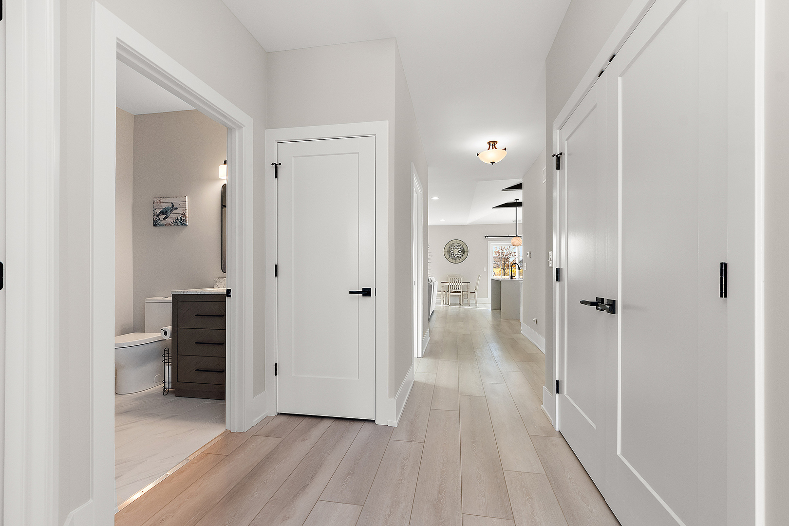 23960 Ann Court Manhattan, IL 60442 - Photo 13 of 31 a view of a hallway with wooden floor and closet area