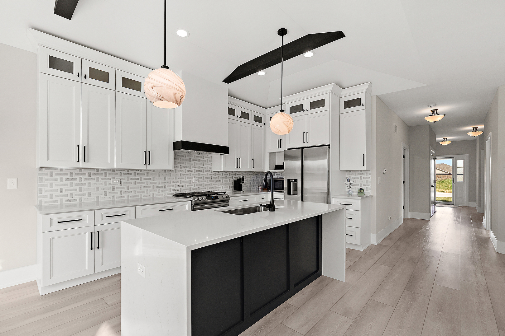 23960 Ann Court Manhattan, IL 60442 - Photo 15 of 31 a kitchen with a sink a counter space appliances and cabinets