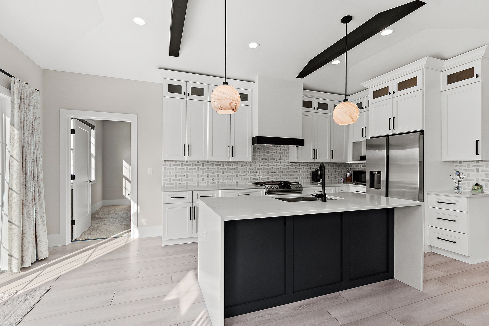23960 Ann Court Manhattan, IL 60442 - Photo 16 of 31 a kitchen with stainless steel appliances kitchen island granite countertop a sink stove and refrigerator