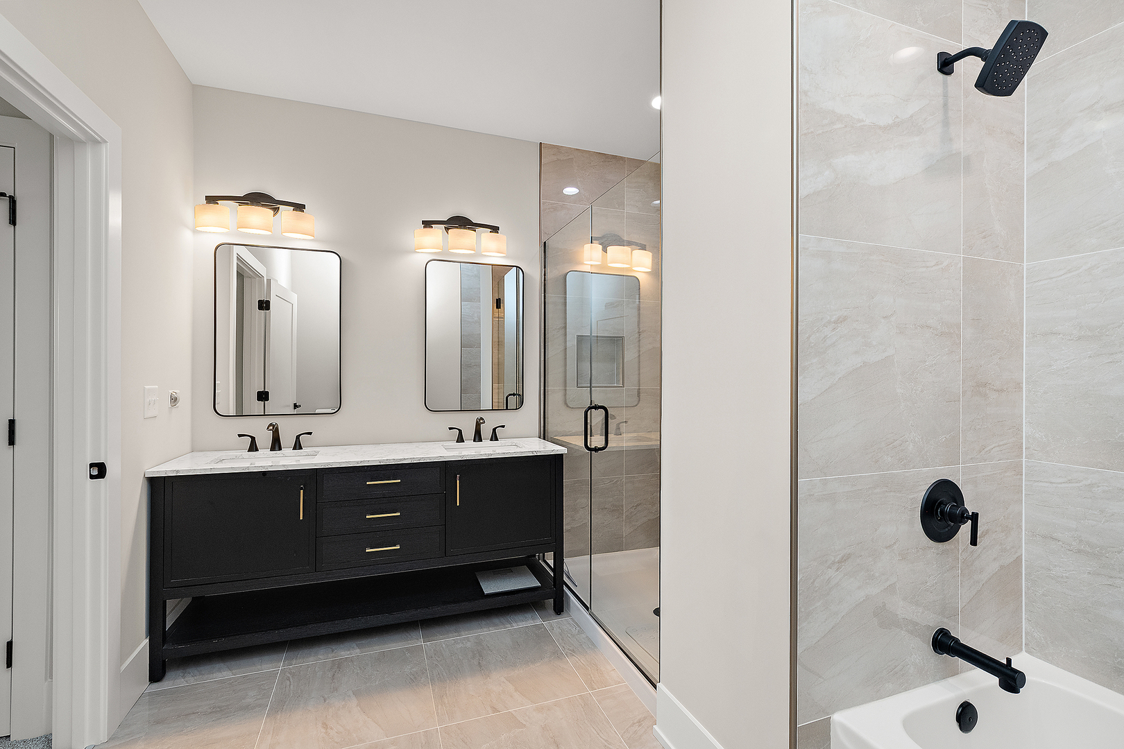 23960 Ann Court Manhattan, IL 60442 - Photo 22 of 31 a bathroom with a double vanity sink a mirror and a shower