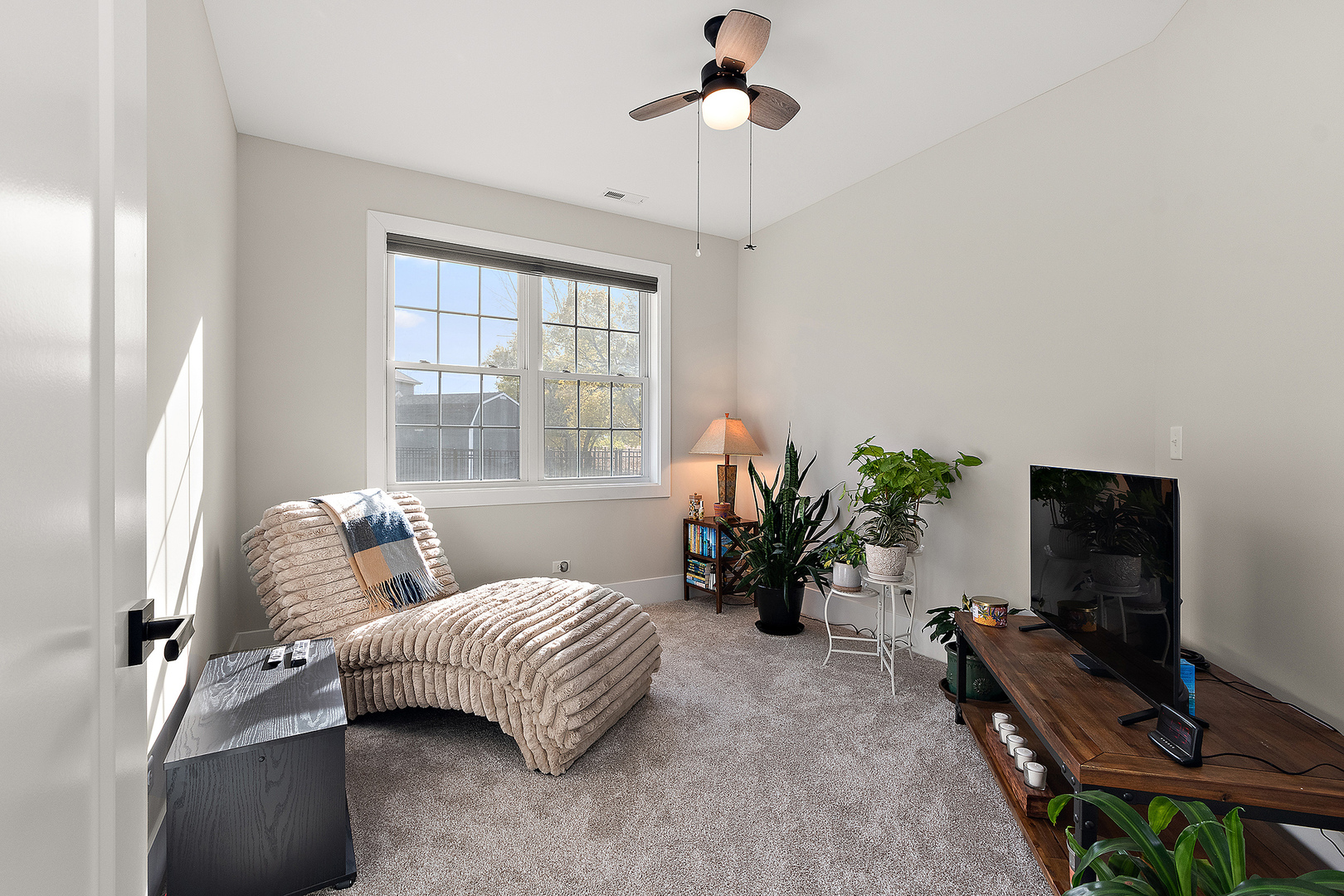 23960 Ann Court Manhattan, IL 60442 - Photo 23 of 31 a bedroom with furniture and a flat screen tv