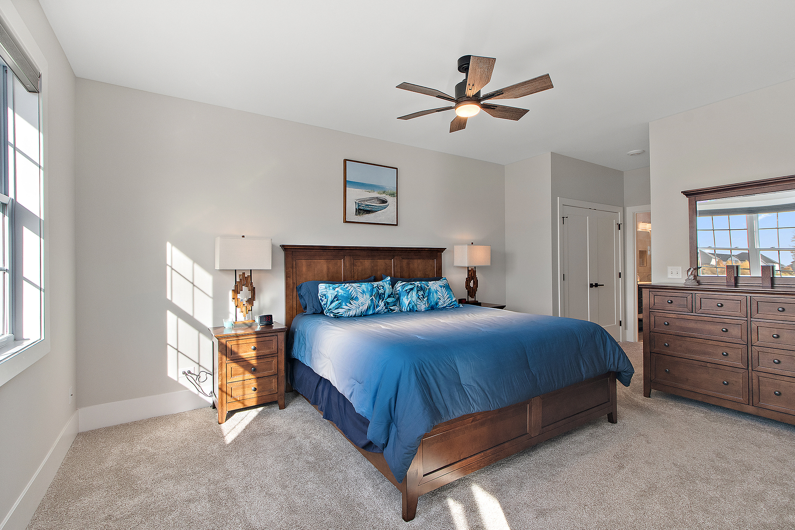 23960 Ann Court Manhattan, IL 60442 - Photo 6 of 31 a bedroom with a bed and a chandelier