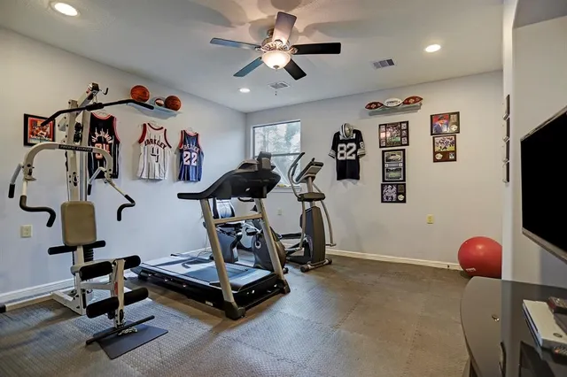 a view of a room with gym equipment