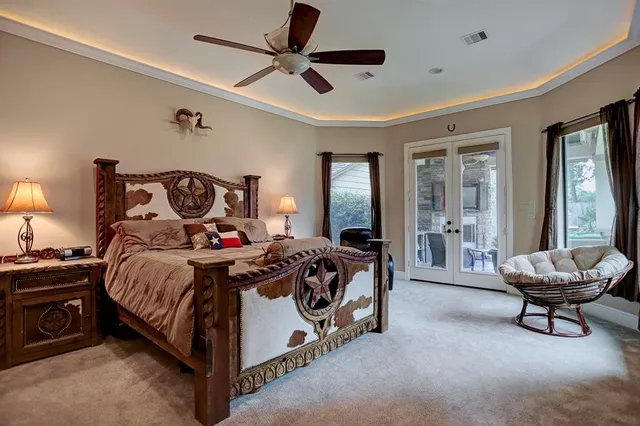 a bed room with a bed and a chair