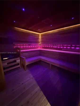 a empty room with a bookshelf