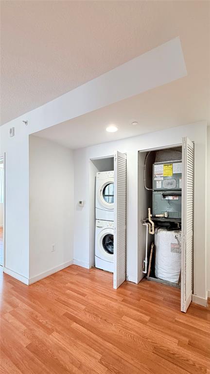 601 Northeast 23rd Street, Unit 902 Miami, FL 33137 - Photo 32 of 49 a view of a livingroom with wooden floor and a refrigerator