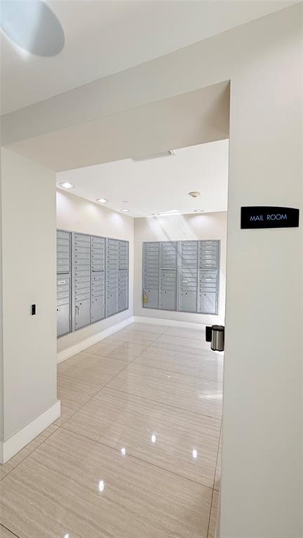 601 Northeast 23rd Street, Unit 902 Miami, FL 33137 - Photo 42 of 49 a view of an empty room with wooden floor