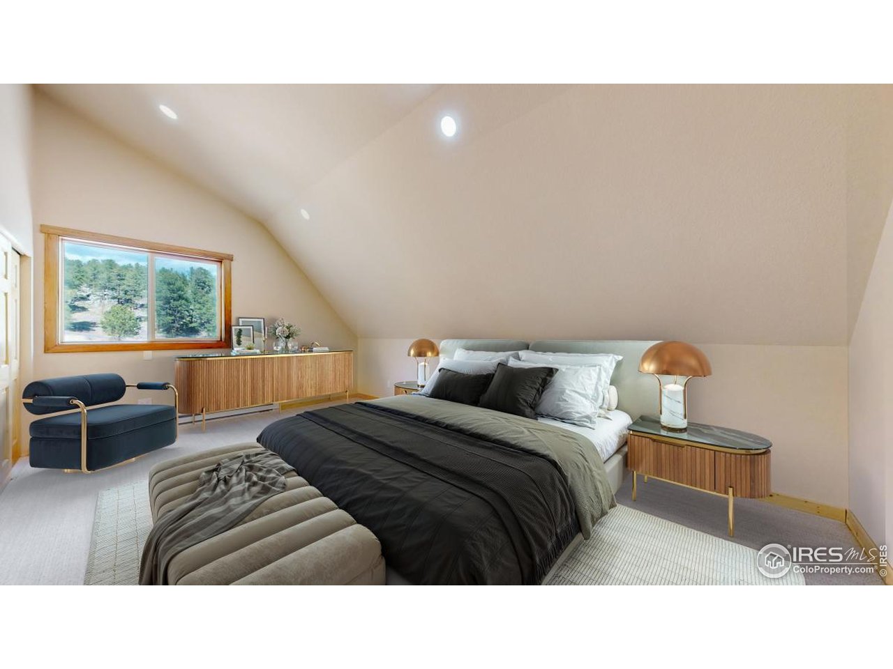 598 Taylor Road Lyons, CO 80540 - Photo 11 of 32 a living room with a bed furniture and a window