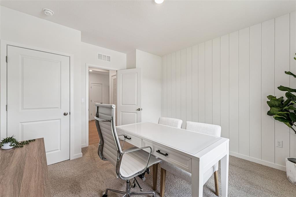2827 House Finch Road St. Cloud, FL 34773 - Photo 31 of 70 a view of a dining room with furniture