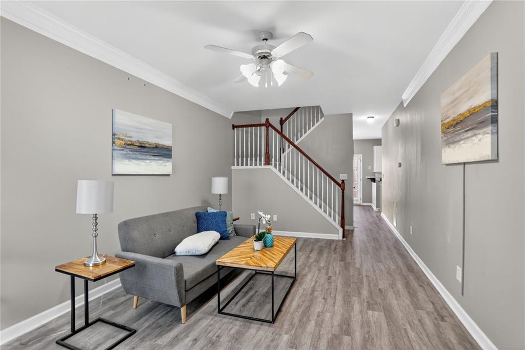 230 Valley Crossing Canton, GA 30114 - Photo 1 of 21 a living room with furniture and wooden floor