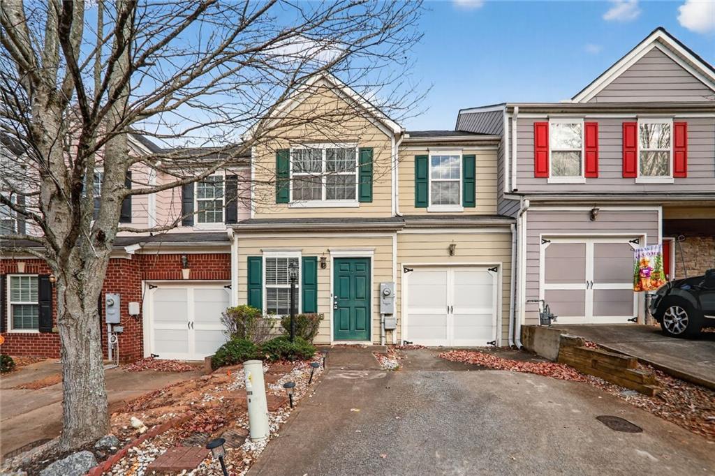 230 Valley Crossing Canton, GA 30114 - Photo 2 of 21 front view of a house with a yard