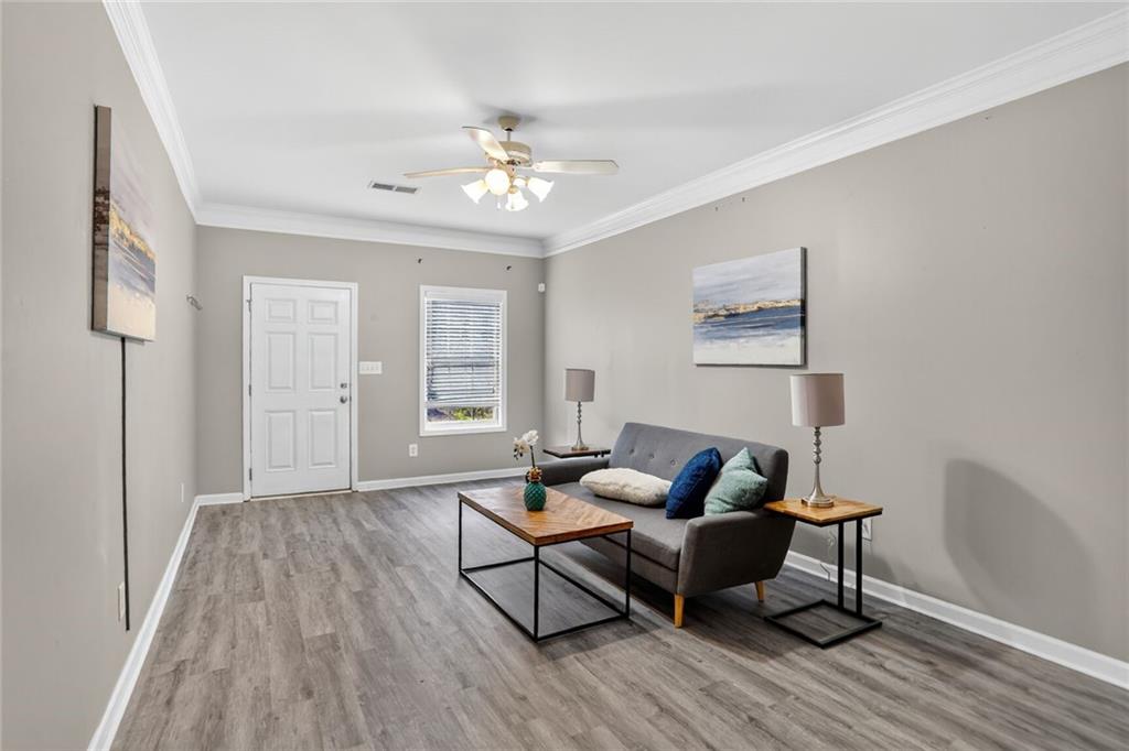 230 Valley Crossing Canton, GA 30114 - Photo 3 of 21 a living room with furniture and wooden floor