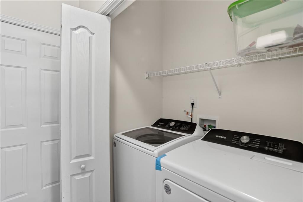 230 Valley Crossing Canton, GA 30114 - Photo 8 of 21 a utility room with dryer and washer