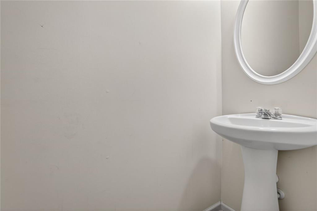 230 Valley Crossing Canton, GA 30114 - Photo 9 of 21 a bathroom with a sink and a mirror