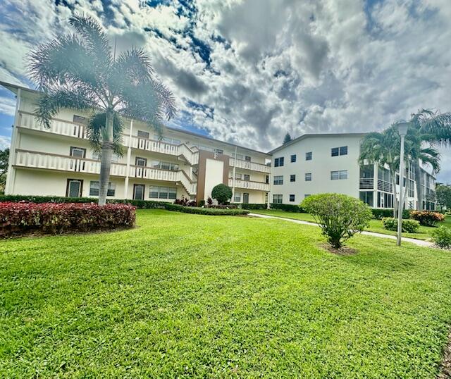 a house view with a garden space