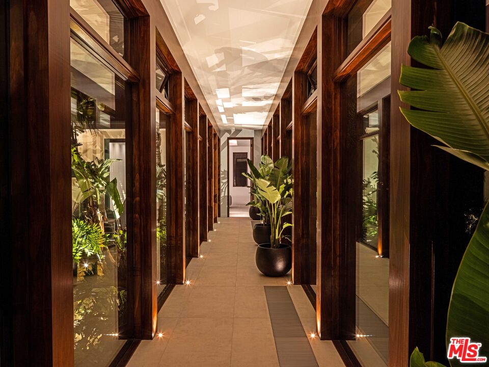 11809 Ellice Street Malibu, CA 90265 - Photo 12 of 39 a view of path along with potted plants