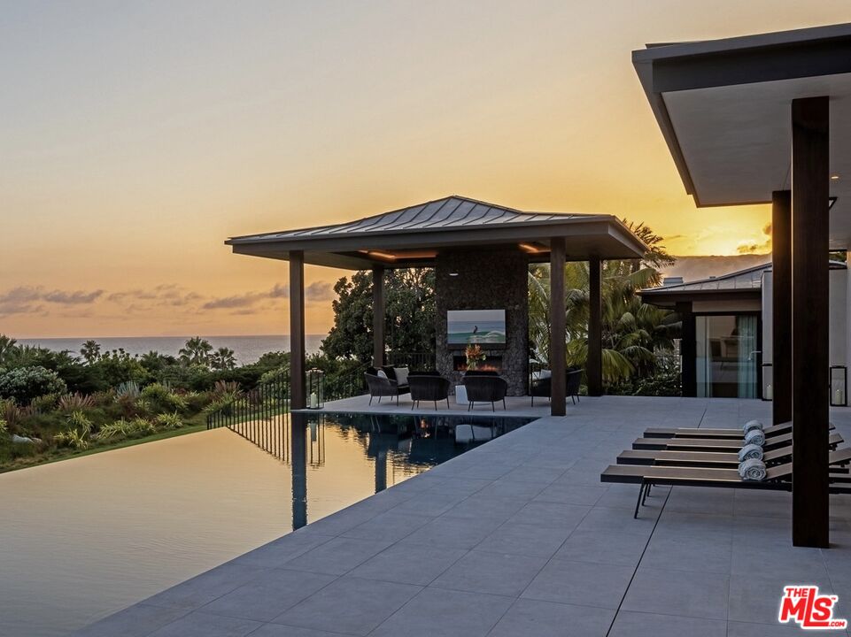 11809 Ellice Street Malibu, CA 90265 - Photo 29 of 39 a view of swimming pool with lounge chair