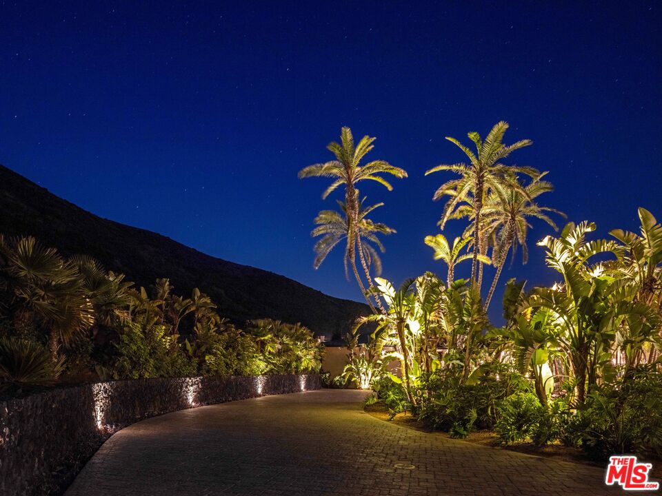 11809 Ellice Street Malibu, CA 90265 - Photo 33 of 39 a view of a street with flower plants
