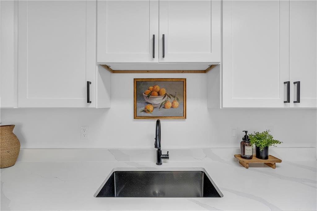 2693 Highway 101 Temple, GA 30179 - Photo 17 of 69 a sink with a close view of a sink a vanity and window