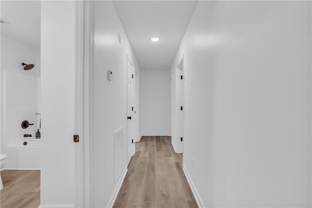 2693 Highway 101 Temple, GA 30179 - Photo 23 of 69 a view of a hallway with wooden floor
