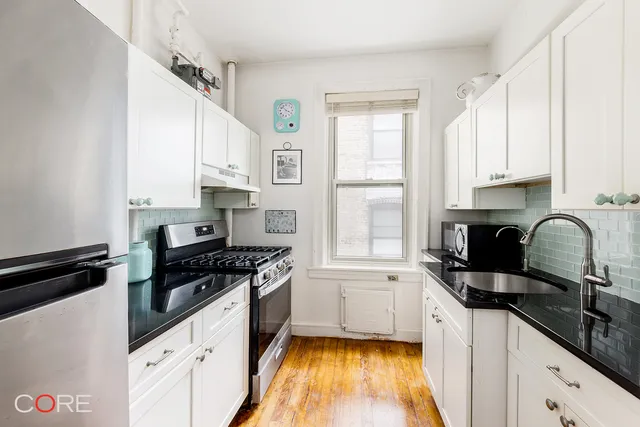 a picture of a park with a bench