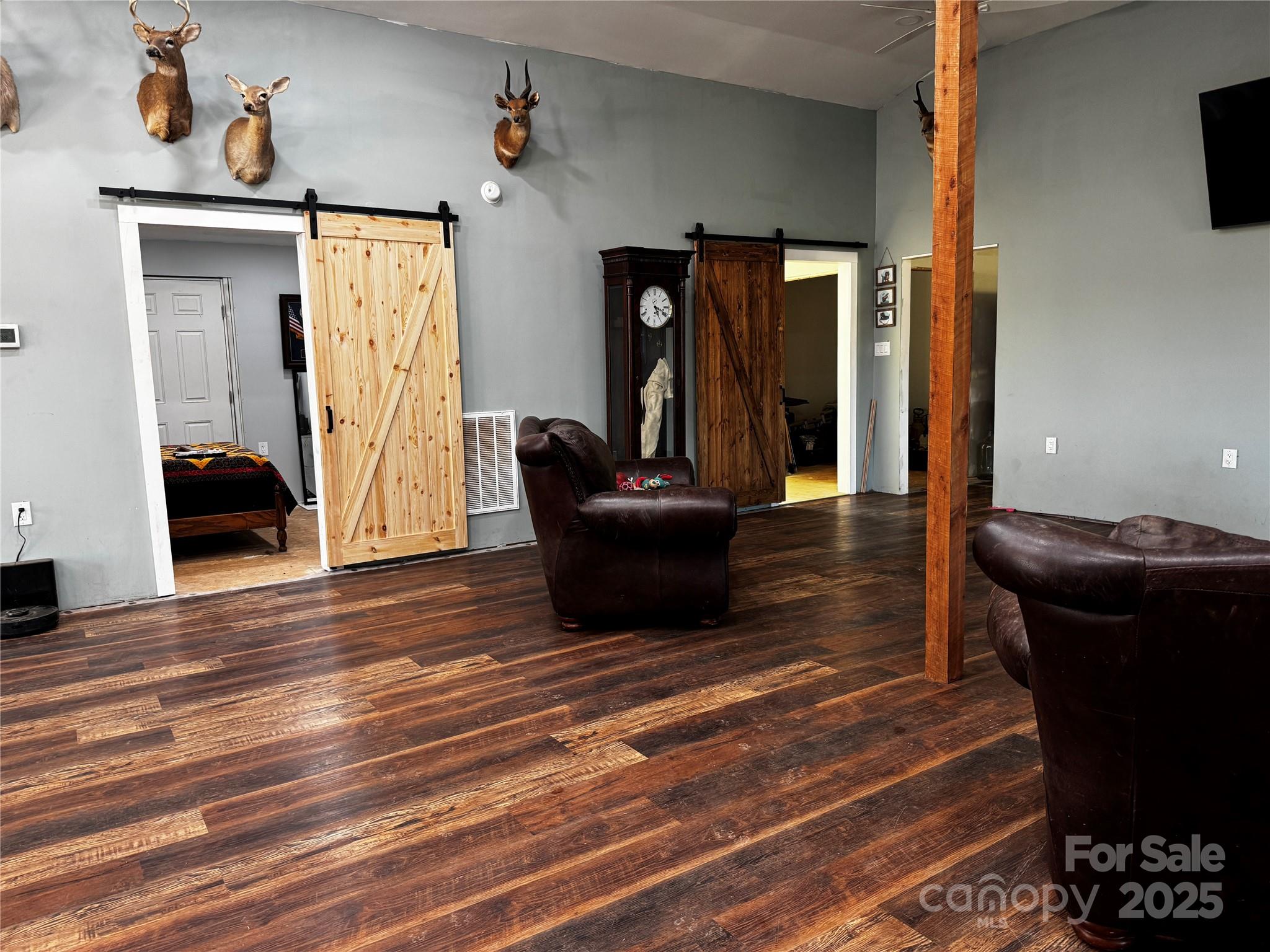 134 Charcoal Road Cherryville, NC 28021 - Photo 26 of 35 a living room with furniture and a wooden floor