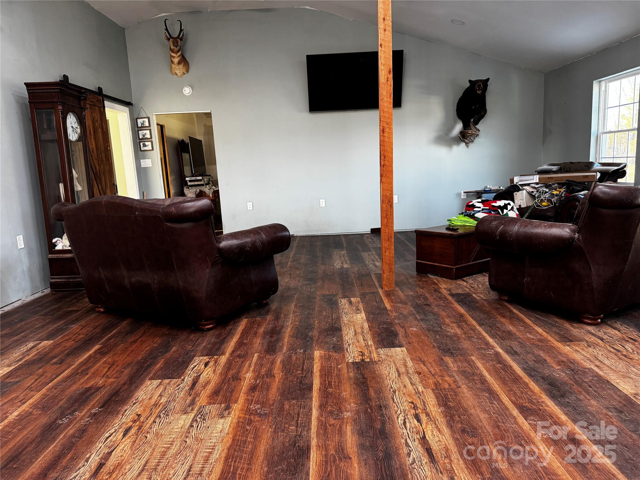 134 Charcoal Road Cherryville, NC 28021 - Photo 28 of 35 a living room with furniture and a flat screen tv