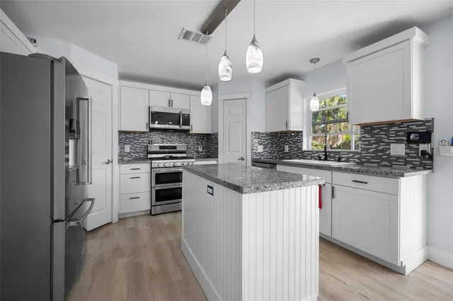 $425,000 | 9285 Galaxie Circle, Port Charlotte, FL 33981