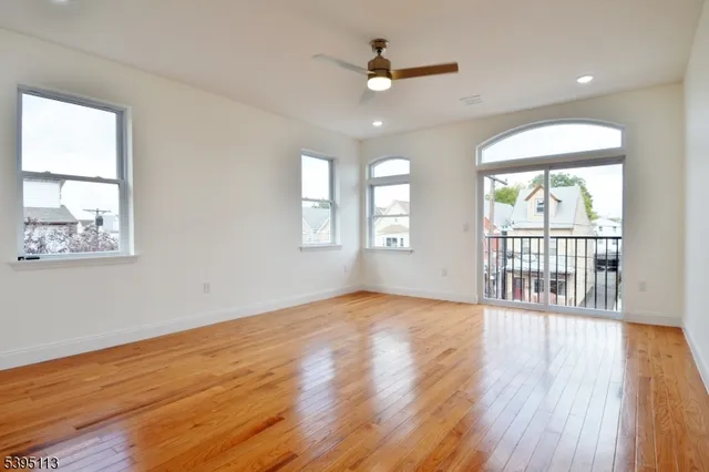 a bathroom with a shower and a sink
