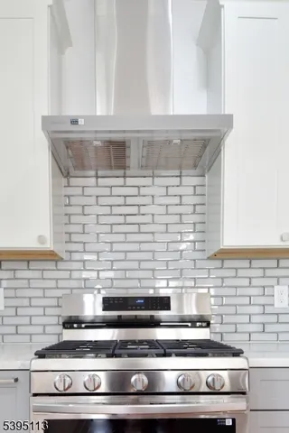 a bathroom with a toilet a sink and a window