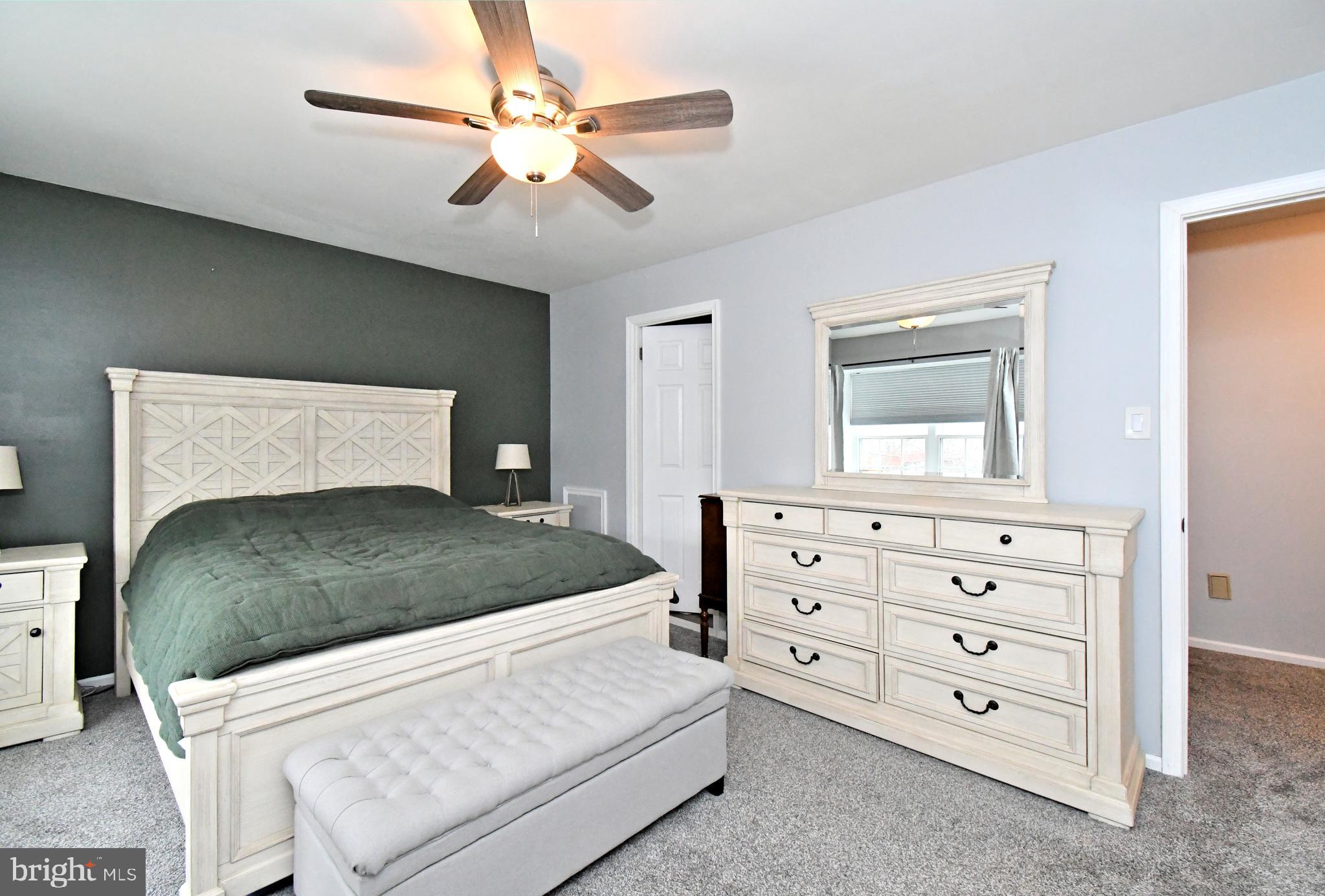 2442 Hillendale Drive Eagleville, PA 19403 - Photo 1 of 1 a bedroom with a bed and a dresser