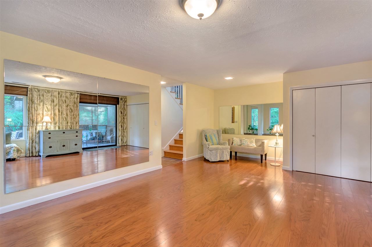1731 Old Forge Road Charlottesville, VA 22901 - Photo 12 of 27 a view of a living room a dining room with furniture