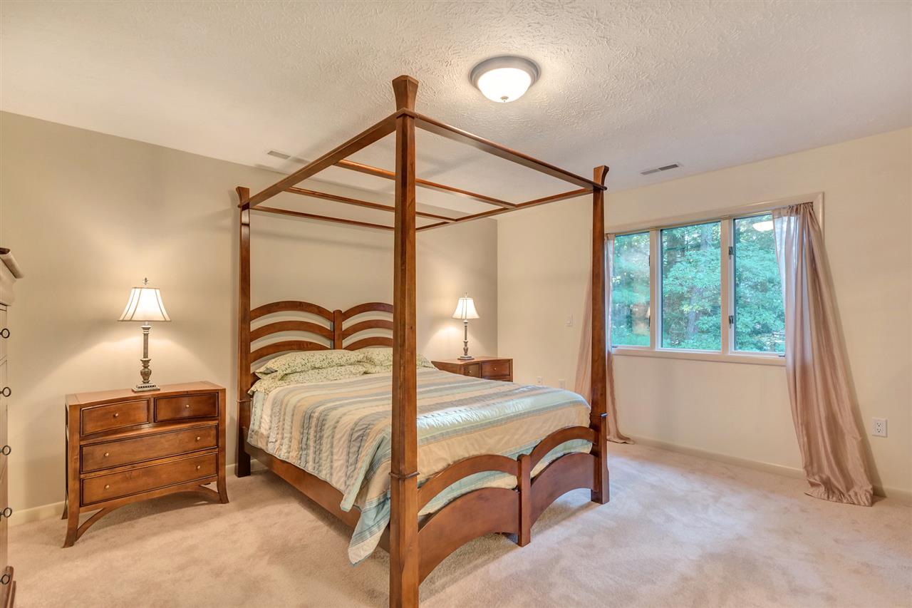 1731 Old Forge Road Charlottesville, VA 22901 - Photo 19 of 27 a bedroom with a bed and a window