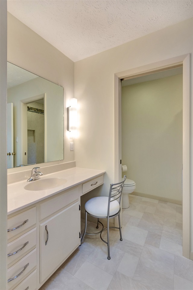 1731 Old Forge Road Charlottesville, VA 22901 - Photo 22 of 27 a bathroom with a sink and a mirror