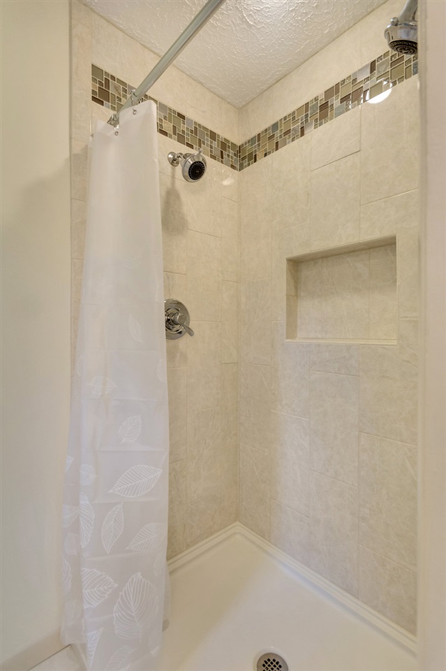 1731 Old Forge Road Charlottesville, VA 22901 - Photo 23 of 27 a bathroom with a shower and a glass door