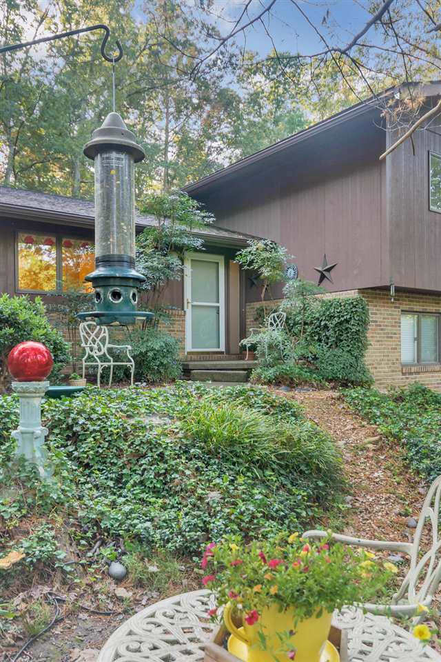 1731 Old Forge Road Charlottesville, VA 22901 - Photo 3 of 27 a backyard of a house with table and chairs