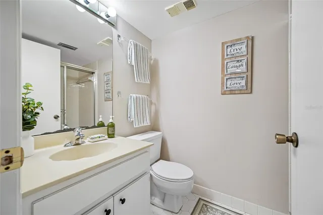 two cars parked in front of a building