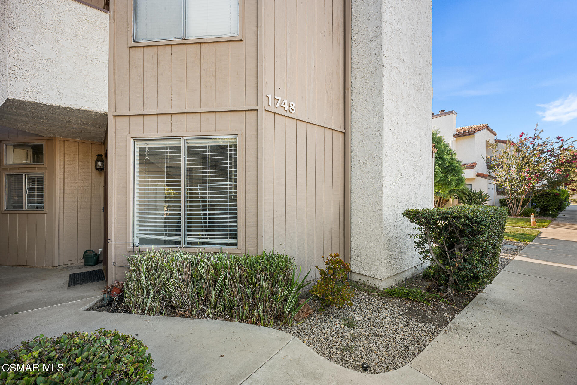 1748 Sinaloa Road, Unit 158 Simi Valley, CA 93065 - Photo 2 of 21 a house with a outdoor space