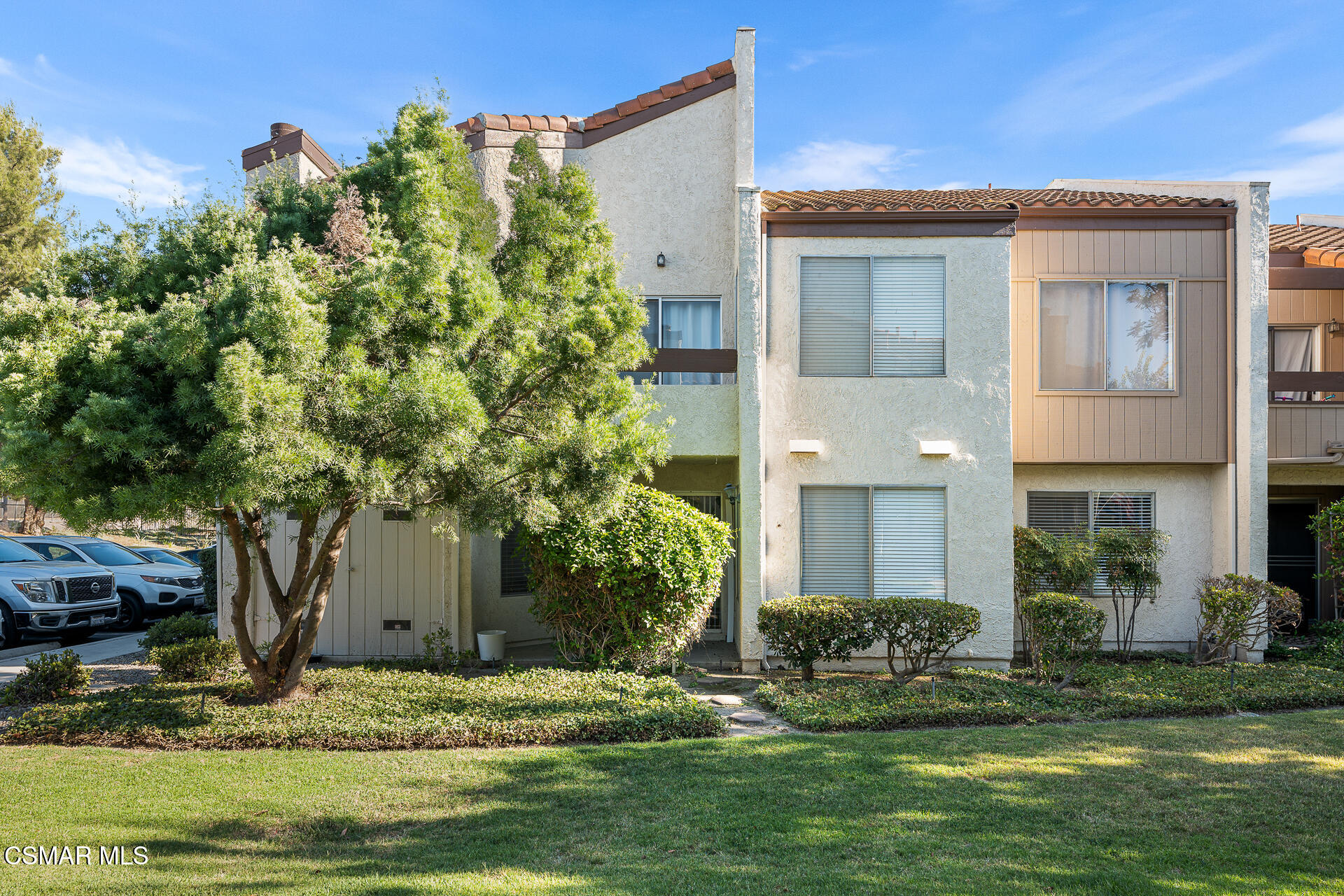 1748 Sinaloa Road, Unit 158 Simi Valley, CA 93065 - Photo 21 of 21 a view of a house with a yard and plants